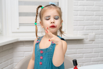 Wall Mural - little girl brightly colored makes a manicure