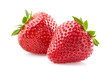 Two strawberries in closeup on white background