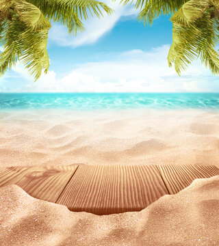 Fototapete -  - tropical fine sandy beach with blured sea sun sky clouds background with wooden table top and empty 