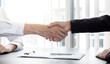 © Puwasit Inyavileart - Close-up of Head of Human Resources and new employees Shake hands to congratulate them on their collaboration, Successful job interviews and the willingness to work together concept.