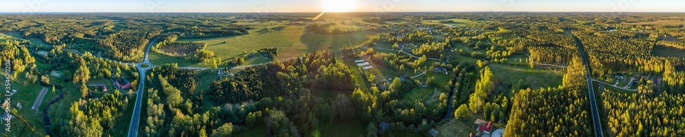 Aerial view of amazing sunset at summer season. Nature landscape. Fields, rivers and trees. - obrazy, fototapety, plakaty 