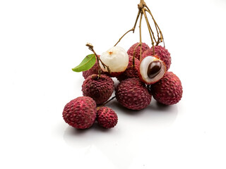 Fruit lychee and sliced in half, isolated on a white background. Healthy properties that are high in vitamin C.