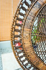 Canvas Print - Closeup shot of a wicker wooden back of a chair with patterns