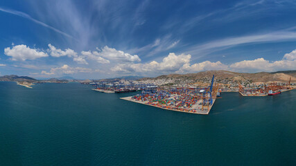 Aerial drone panoramic photo of industrial loading/unloading logistics container area of Perama, Piraeus port, Attica, Greece