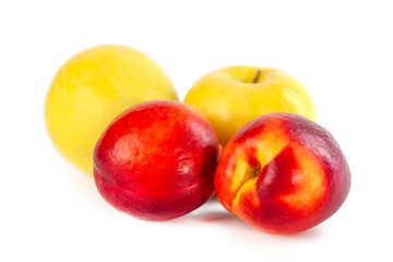 Fresh organic peach and apple isolated on white background