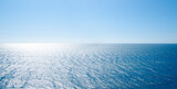 Fototapeta Na sufit - Panoramic seascape vivid blue sea with waves and clear sky