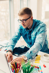 Web designer working on the best framework of a new application