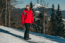 A Man In A Red Ski Jacket On The Background Of The Ukrainian Carpathian Mountains. Mount Homyak