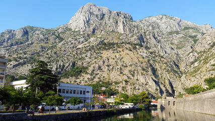 town Kotor in Montenegro and light gray mountains at summer