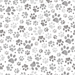 Doodle grey paw print seamless fabric design repeated pattern with grey background