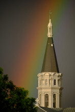 A Rainbow Behind A Church Steeple In Verdun, (Montreal), Quebec, Canada, During Golden Hour.