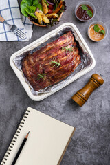 Wall Mural - Grilled pork ribs with Vegetables and sauces on a drak table