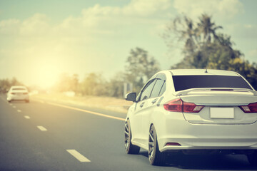 Wall Mural - White car driving travel on  highway road transportation asphalt performance automotive auto car fast drive on road,Vehicle on street drive speed