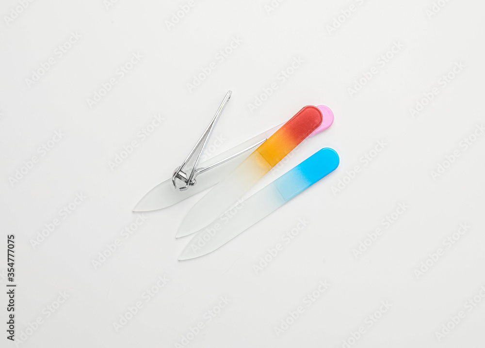 Supplies for manicure on white background