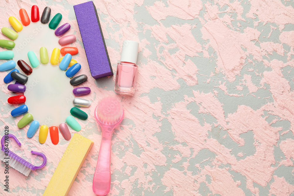 Supplies for manicure on color background
