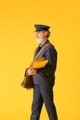 Poster - Handsome old postman on color background