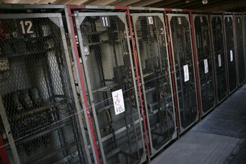 Poster - High angle shot of the metal cages of some industrial equipment and tools