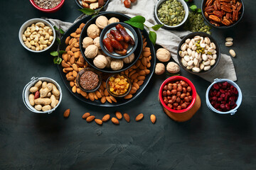 Wall Mural - Different types of nuts, seeds and dried fruits