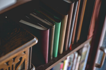 Antique bookshelf, leather books and gramophone.