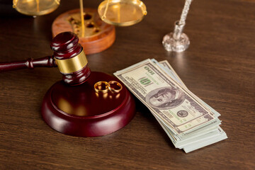 Wall Mural - Close-up Of Wedding Rings And Wooden Gavel.