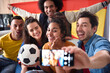 © gpointstudio - Group of football fans making selfie with funny faces