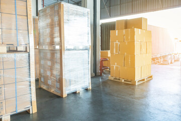 Poster - Large shipment pallets goods in interior warehouse storage. shipment cargo export. Warehouse industry shipping logistics.