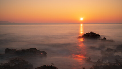 Wall Mural - sunset over the sea in Guernsey