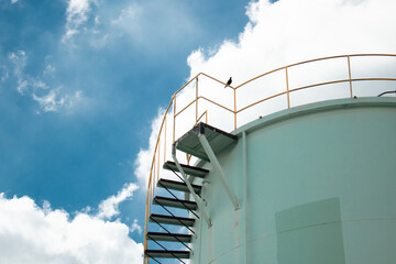 stairway to sky iron staircase beside the water tank 