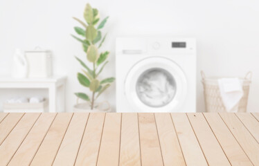 Wooden planks table template in laundry room for product display