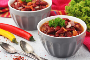 Two bowls with traditional Georgian dish - lobio