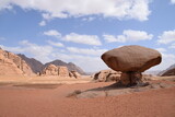 Fototapeta  - Huge rock that looks like a mushroom in the desert, Wadi Rum Dessert, Jordan