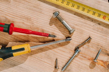 woodworking tolls, chisels and mallet on a workbench