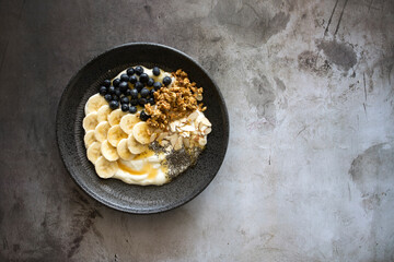 Wall Mural - Yogurt with Banana, Blueberries, almonds and Chia Seeds