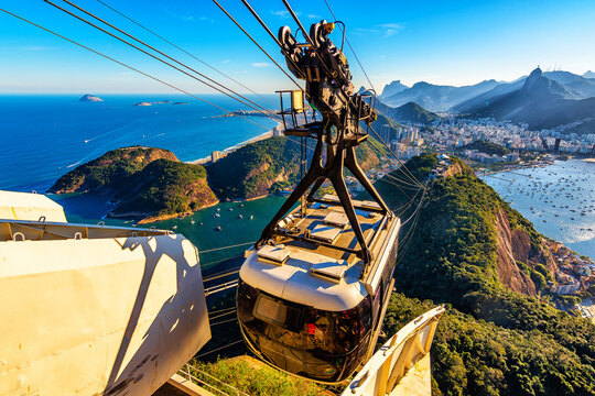 sugar loaf mountain cable car overlooking christ the redeemer statue in corcovado mountain, rio de j