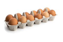 One Dozen Brown Eggs In A Cardboard Egg Carton Isolated On White