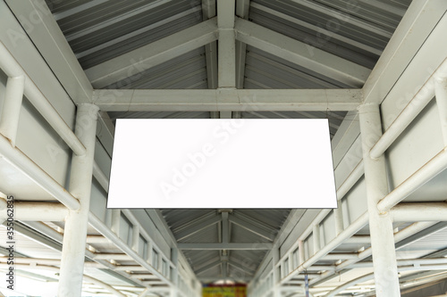 Fotomural Blank advertising billboard hanging in the supermarket