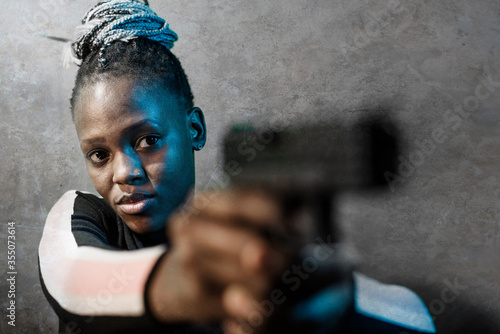 Cuadros en Lienzo Hollywood movie style portrait of young attractive and confident black African A