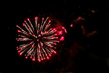 Red Fireworks Against The Night Sky