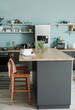 © Pixel-Shot - Interior of modern kitchen with stylish table