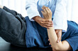© Lucky7Trader - Physical therapy is doing hand therapy for patients in the hospital