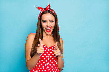 Poster - Close-up portrait of her she nice-looking attractive lovely cute cheerful cheery straight-haired girl pointing at you flirting inviting isolated over bright vivid shine vibrant blue color background