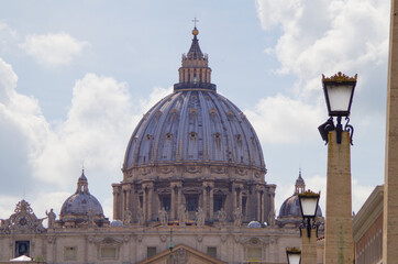 Sistine Chapel and St. Peter´s Square with old historic buildings and columns in Rome, Italy