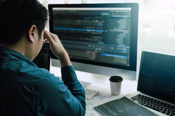 Software developers headache with code analysis in the office.