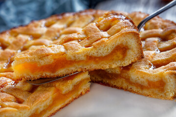 Wall Mural - slices of apricot shortcrust pie, top view