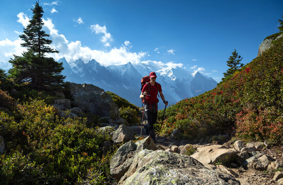 Fototapete -  - A man hiking on the famous Tour du Mont Blanc near Chamonix, France.
