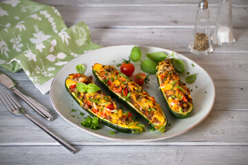 Canvas Print - Zucchini stuffed with meat, vegetables and cheese. Zucchini boats. Loaded zucchini. Horizontal image