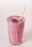 Fototapeta Kwiaty - Berry lassi from fermented baked milk. Sour-milk shake.