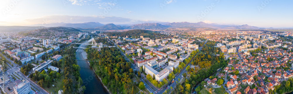 Obraz na płótnie Podgorica, capital of Montenegro: panoramic aerial view. The city is renowned for its green parks. This small country is located on the Balkans peninsula on the Mediterranean, in South Eastern Europe. w salonie