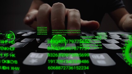 Wall Mural - man working on laptop computer keyboard with graphic user interface gui hologram showing concepts of