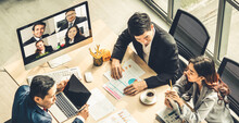 Video Call Group Business People Meeting On Virtual Workplace Or Remote Office. Telework Conference Call Using Smart Video Technology To Communicate Colleague In Professional Corporate Business.